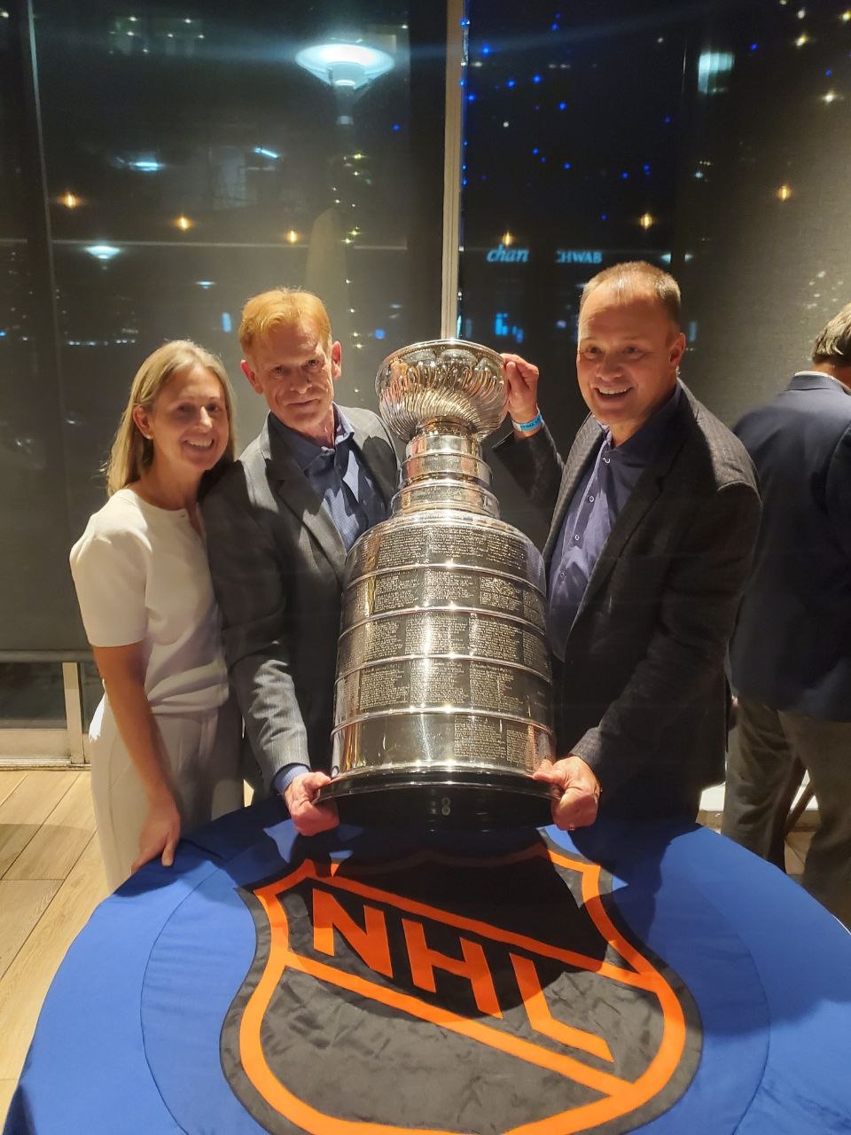 Robert McLean with teammates and the Stanley Cup at the 30-year reunion in Denver, 2025